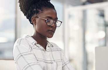 Image showing Professional, woman and focus on laptop for entrepreneurship in Africa on the internet. Female employee, reading and computer screen for company with technology and glasses for digital design.