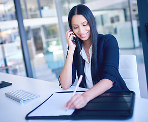 Image showing Business woman, phone call and notebook writing on lawyer contact in office with communication. Working, law firm report and mobile connectivity of a employee talking about company schedule document