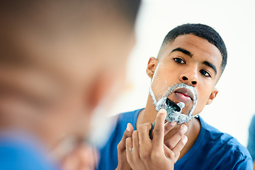 Image showing Hair removal, face and shaving with man in bathroom for grooming, morning routine and cleaning. Skincare, razor and self care with male person in mirror at home for facial, beard and hygiene