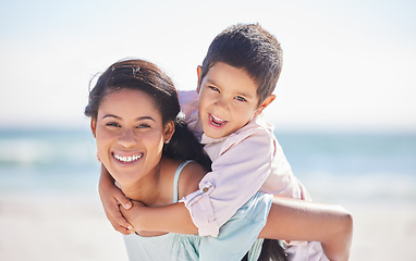 Image showing Piggyback, mother or portrait of kid on beach together on a fun summer holiday vacation with smile. Affection, lovely parent or happy boy child bonding or hugging mom at sea or nature on weekend trip