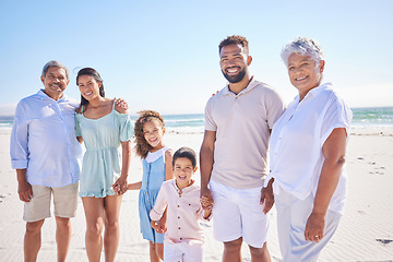 Image showing Happy family, grandparents portrait or children at sea holding hands to relax on holiday together. Dad, mom or kids siblings love bonding or smiling with grandmother or grandfather on beach sand