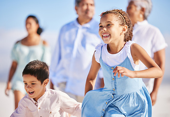 Image showing Excited, beach or happy kids running or playing in summer with happiness, joy or wellness in nature. Children, lovely girl or young boy bonding with a happy girl or playful sister walking together