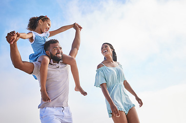 Image showing Piggyback, sea or parents walking with a child for a holiday vacation together with happiness in summer. Holding hands, mother and father playing or enjoying family time with a happy girl or kid