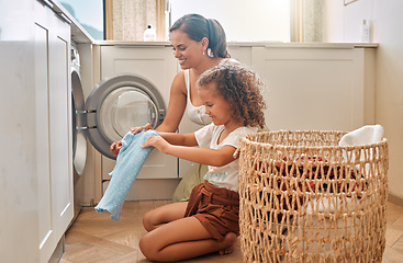 Image showing Cleaning, help and washing machine with mother and daughter for laundry, learning and cleaner. Housekeeping, teamwork and basket with woman and young girl in family home for teaching and clothes