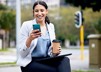 Image showing Business woman, coffee break and city with phone for contact, communication or smile at meme on social media. Happy female worker outdoor, travel with online chat and relax with drink, mobile or tech