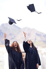 Image showing Graduation cap, excited friends and throw in air for celebration, study success and achievement on campus. University students, happy people or women celebrate for college, school and education