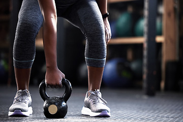 Image showing Fitness, kettlebell or hands of woman in training, workout or bodybuilding exercise for grip strength or power. Body builder, arms closeup or strong athlete at gym to start lifting heavy weights