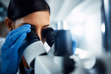 Image showing Woman, scientist and microscope for forensic science research, discovery or data analysis at lab. Female person, medical professional and scientific results for cure, virus or vaccine in laboratory