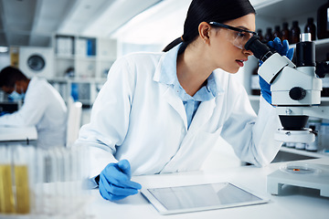 Image showing Microscope, digital tablet and woman scientist in a laboratory for science, research and data analysis. Healthcare, investigation and female expert online for medical, innovation and development