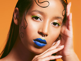 Image showing Makeup, neon cosmetic and portrait of woman in studio for cosmetics, eye shadow art and beauty. Creative color, aesthetic and face of female person with blue lipstick for glamour, fashion and style