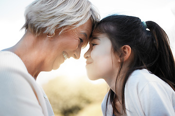 Image showing Grandmother, girl and close with happiness in nature with love in outdoor with family and sun. Kid, grandma and noses with smile and loving in the garden with bonding together on the weekend for joy.