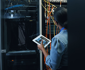 Image showing Server room, engineer and woman with a tablet for programming, cybersecurity or cable maintenance. Black female technician or IT in datacenter for network, software system upgrade with technology