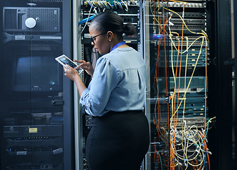 Image showing Server room, woman and engineer with tablet for cybersecurity, programming or cable maintenance. Black female technician in datacenter for network, software or system upgrade with IT app and internet