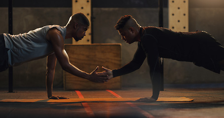 Image showing Fitness, high five and men with floor push up at a gym for support, motivation and training goals. Team, handshake and man with personal trainer for weight training, performance and workout routine