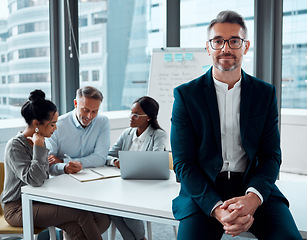 Image showing Portrait, leadership and business man, ceo or entrepreneur in office meeting, company and team. Corporate professional, executive and mature manager with confidence, pride and working with experience