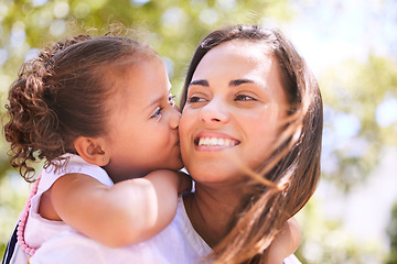 Image showing Mother, child and kiss in nature, piggyback or bonding on happy summer holiday. Mom, ride and girl kissing cheek, love and affection, care and enjoying quality family time together in outdoor park.