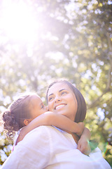 Image showing Family, child and mother kiss outdoor in nature for summer fun with happiness, love and care. Woman or mom and happy girl kid playing together at a park for adventure, quality time and freedom