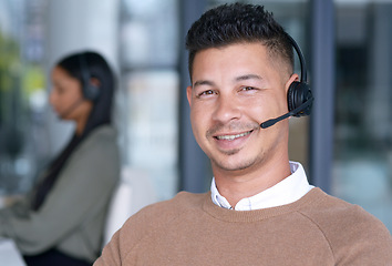 Image showing Man with smile in portrait, call center with CRM and contact us, communication with headset and technology in office. Male consultant, face with customer service or telemarketing with help desk job