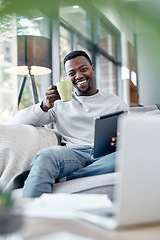 Image showing Portrait, coffee and tablet with a black man on a sofa, sitting in the living room of his home to relax. Smile, technology and internet with a happy person relaxing in a house to browse social media