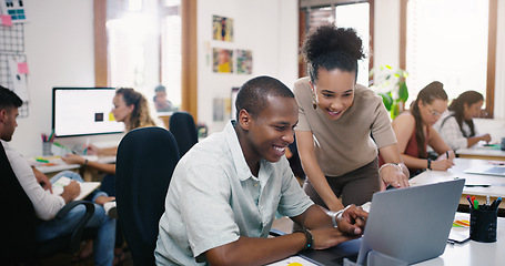 Image showing Developer, colleagues discussing and laptop at desk in office at their coworking space. Teamwork, collaboration and communication and coworkers work together with problem solving on project