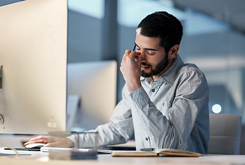 Image showing Call center, man and headache at computer for stress, burnout and problem with client communication at night. Tired telemarketing consultant at desktop with crisis , frustrated and bad sales service