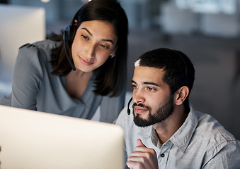 Image showing Call center, team leader and computer for customer service, training of software and CRM in office. Focused man, woman and sales mentor helping intern on desktop, technical support and telemarketing