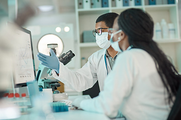 Image showing Medical research, scientists working together and planning with computer in a laboratory. Collaboration or teamwork, analysis and professional doctors or researchers discussing data in a lab at work