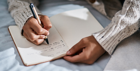 Image showing Notebook, bedroom and man hands planning, brainstorming and work from home notes, freelance and reminder. Journal, priority and person in bed for list, planner and schedule or time management goals