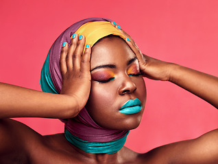 Image showing Makeup, beauty and wrap with black woman in studio for creative, art and culture. Fashion, cosmetics and natural with face of model isolated on pink background for african and color mockup