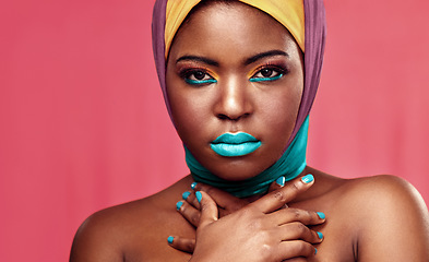 Image showing Makeup, scarf and portrait of black woman in studio for creative, art and culture. Fashion, cosmetics and pride with face of model isolated on pink background for african, color and beauty mockup