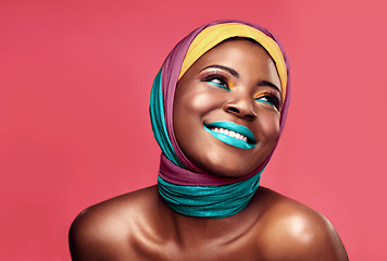 Image showing Makeup, beauty and scarf and happy with black woman in studio for creative, art and culture. Fashion, cosmetics and wrap with face of model isolated on pink background for african and color mockup