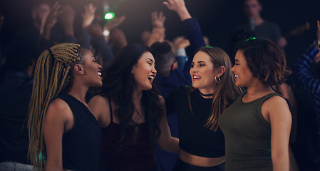 Image showing Music, party and night with women in club for dance, celebration and nightlife concert. Festival, disco and happy hour with friends dancing in crowd at social event for energy, techno and dj show