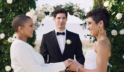 Image showing Love, wedding and lgbtq with lesbian couple holding hands for celebration, happy and pride. Gay, spring and marriage ceremony with women at event for commitment, queer sexuality and freedom