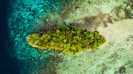 Image showing Drone, water or island for travel, adventure or exploring nature from above. Empty, paradise and aerial view of tropical environment, beauty or scenery in Indonesia for traveling, tourism or vacation