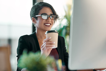 Image showing Business woman, happy and computer, coffee and working in office planning, online reading and editing in her office. Inspiration, creative ideas and professional worker or person review on desktop pc