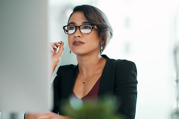 Image showing Computer, research and business woman in glasses reflection for reading, online review or editor analysis. Focused Latino person or professional worker in website editing or analytics on desktop pc