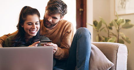 Image showing Couple, credit card and laptop for online shopping with virtual wallet, booking or internet payment at home. Love, ecommerce and happy woman with partner for security information or banking on sofa