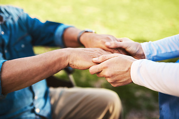 Image showing Senior, nurse and holding hands in wheelchair for elderly support, healthcare or life insurance in nature. Hand of caregiver helping male patient or person with a disability outside nursing home