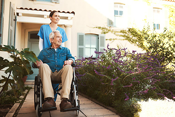 Image showing Senior man, nurse and wheelchair for walk, relax or healthcare support in garden at nursing home. Happy elderly male and woman caregiver walking patient with a disability or retirement in nature