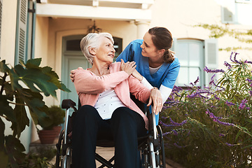 Image showing Senior woman, wheelchair and nurse in healthcare support, talking or garden walk at nursing home. Happy elderly female and caregiver helping patient or person with a disability, health or retirement
