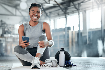 Image showing Social media, smile or black woman with phone in gym to search for sports online in training or exercise. Fitness app, happy or healthy athlete relaxing or resting online mobile content on break