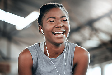 Image showing Happy, portrait or black woman with headphones in gym to workout, exercise or training for wellness. Face of sports girl or healthy fitness athlete laughing with positive mindset listening to music