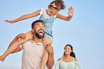 Image showing Smile, parents or kid walking on beach to relax on happy family holiday or fun summer vacation together. Lovely dad, shoulder or excited young girl bonding, smiling or enjoying quality time with mom