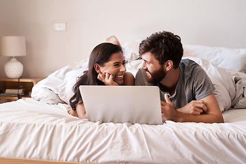 Image showing Bed, laptop and happy couple relax, smile and excited for for web info, morning blog or website notification. Home bedroom, eye contact and people bond, doing online shopping or internet search