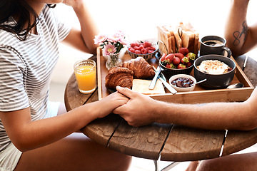 Image showing Restaurant food, breakfast or couple holding hands for support care, security or love on Valentines Day date. Cafe meal, marriage bond and brunch tray of croissant, strawberry or bread in coffee shop