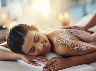 Image showing Happy woman, salt scrub and massage back at spa to relax for skincare, exfoliation or self care. Female person, beauty and smile for luxury body treatment, health and wellness with masseuse at salon
