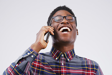 Image showing Phone call, laugh and happy black man in studio for conversation, talking and funny chat. Communication mockup, white background and male person on smartphone for network, contact and connection