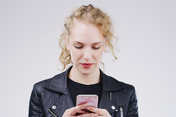 Image showing Contact, mockup and woman with a smartphone, typing and communication against a white studio background. Female person, model and girl with a cellphone, connection and search internet for information