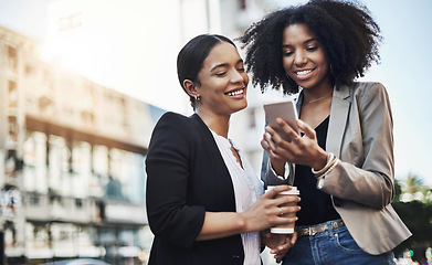 Image showing Business people, phone and city for social media, communication or team collaboration outdoors. Happy woman employees or friends with smile on mobile smartphone for networking or travel in urban town