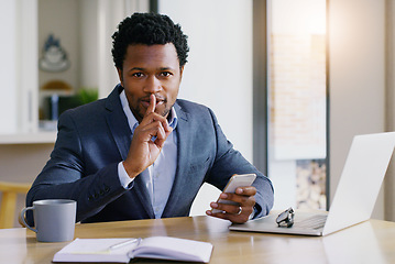 Image showing Business, black man and secret portrait with phone and work from home with whisper. African male person, employee and laptop of a online finance worker hush gesture with confidential information